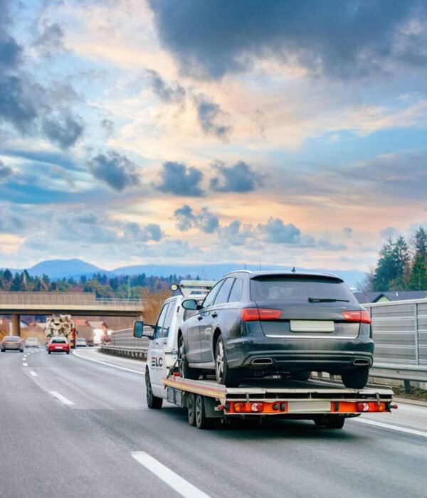 car towed on truck car towed on truck